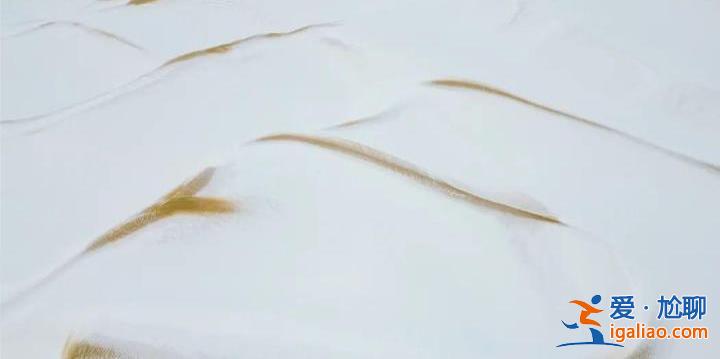 沙海变成了雪海 塔克拉玛干沙漠下雪了？